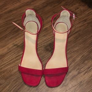 Strappy red heels